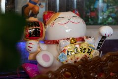 09/17/2019 – WESTMINSTER, CALIF: A maneki-neko, or "beckoning cat," is stationed next to the counter in 4 Seasons Tea as a good luck charm. Photograph by Dillon Hulse (ISO 640, 1/200 sec at f / 4.0)