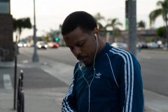 11/14/19 – LONG BEACH, CALIF: Rapper Asa Asa recently moved from Chicago and was just about to get cleaned up in the barber shop. Photograph by Dillon Hulse.