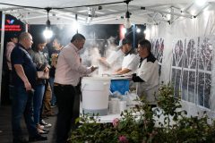 12/07/19 – LONG BEACH, CALIF: Business picks up during the weekend for the Taqueria Los Tres Garcia food truck, parked in a car-wash parking lot on Anaheim a block down from Redondo. Photograph by Dillon Hulse.