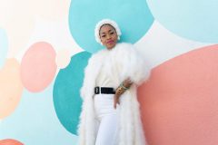 Ranitra Lavon, @missgolden_lady on Instagram, poses for an Easter-themed shot outside of Wild Child Party and Supply in Long Beach on Sunday morning, March 8, 2020. Photograph by Dillon Hulse.